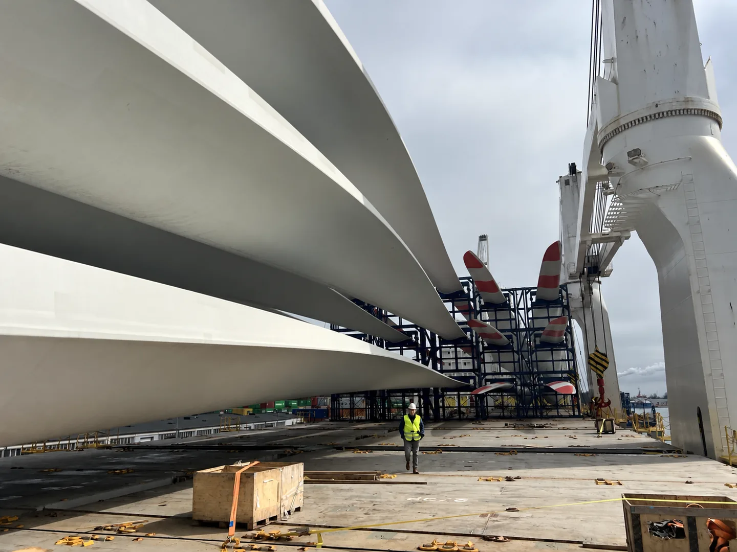 Wind turbine blades secured on a project cargo vessel deck