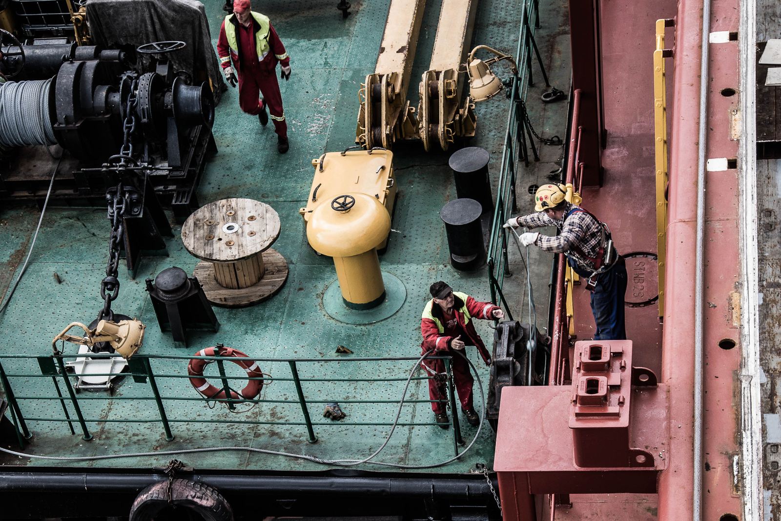 Vessel crew working on deck during port operations